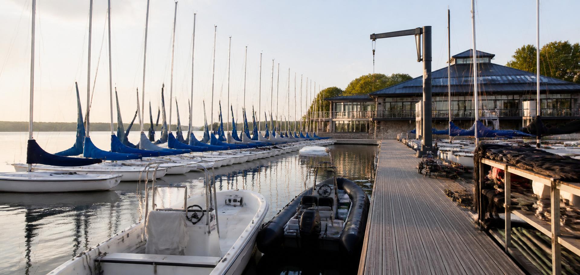 An organized yacht club fleet prepared for a day of operations.