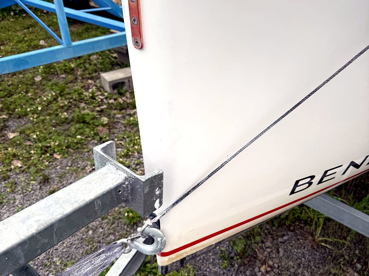 Clean sailboat hull and bow detail.